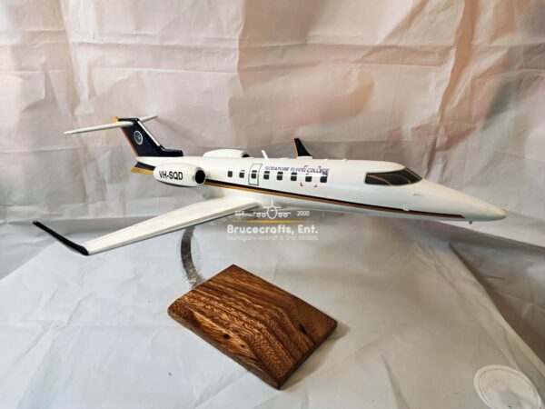 Model of Learjet 45 Singapore Fying College with detailed craftsmanship.